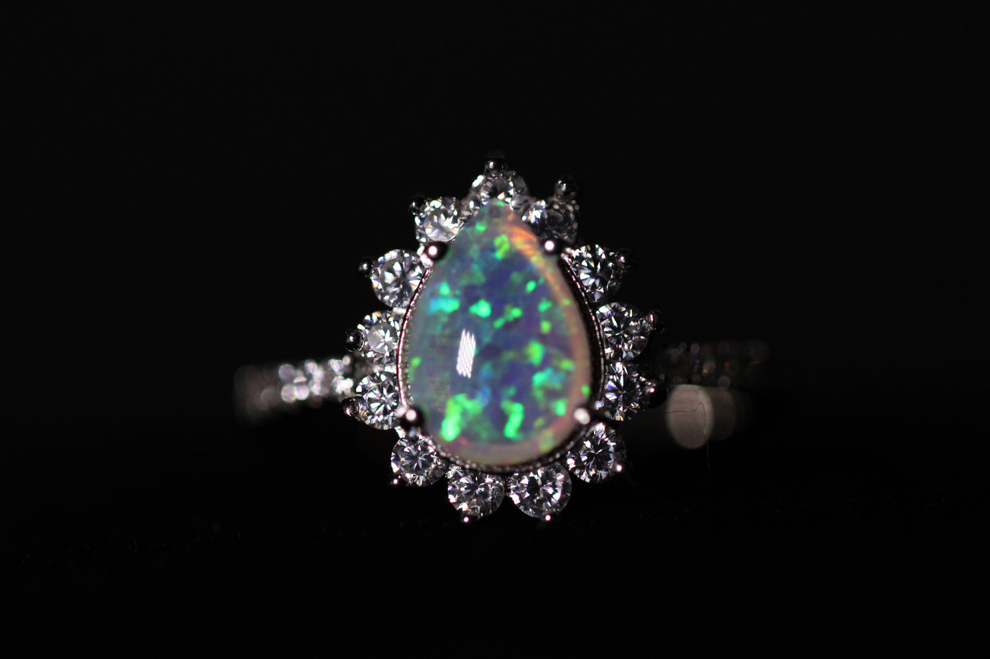 Cheryl M Sterling Silver Rhodium-plated Cabochon Lab Created Opal and Brilliant-cut CZ Teardrop Halo Ring