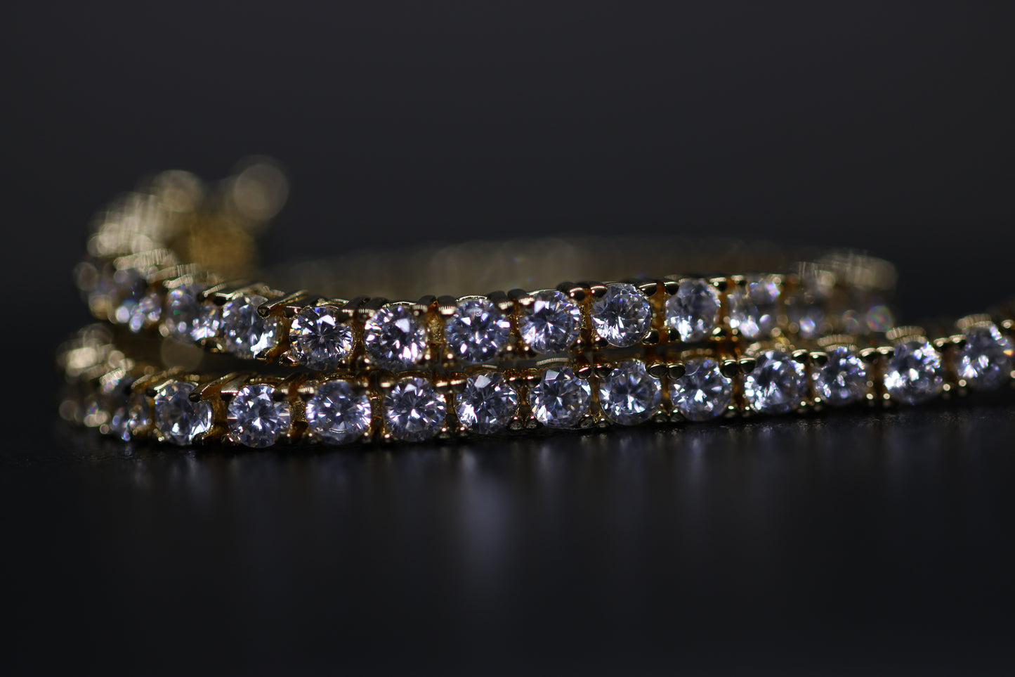 Kelly Waters Gold-plated Prong Set CZ 7.25 inch Tennis Bracelet